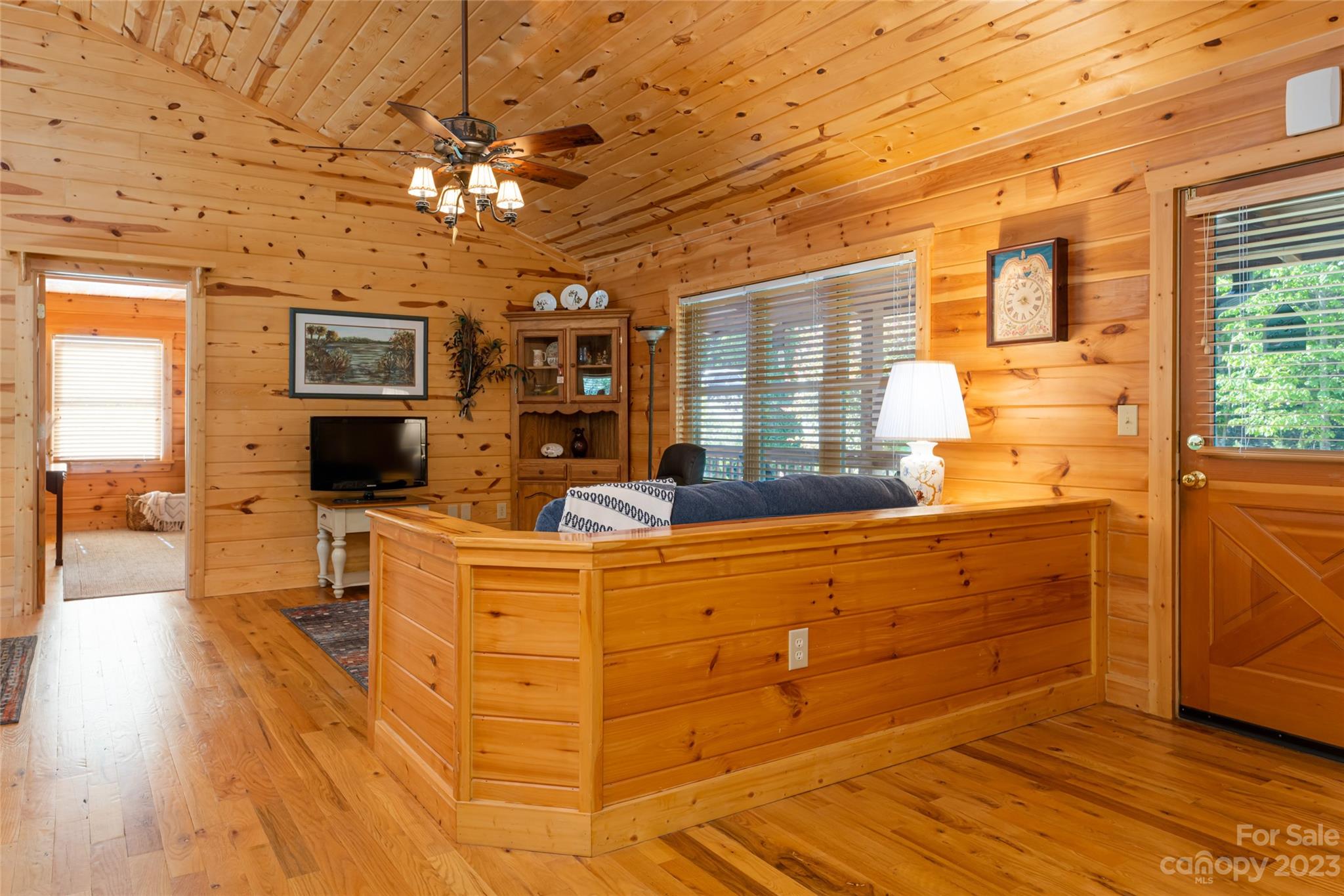 134 Quebec Trail Bostic, NC 28018 - Photo 7 of 37 a living room with stainless steel appliances kitchen island granite countertop furniture and a fireplace