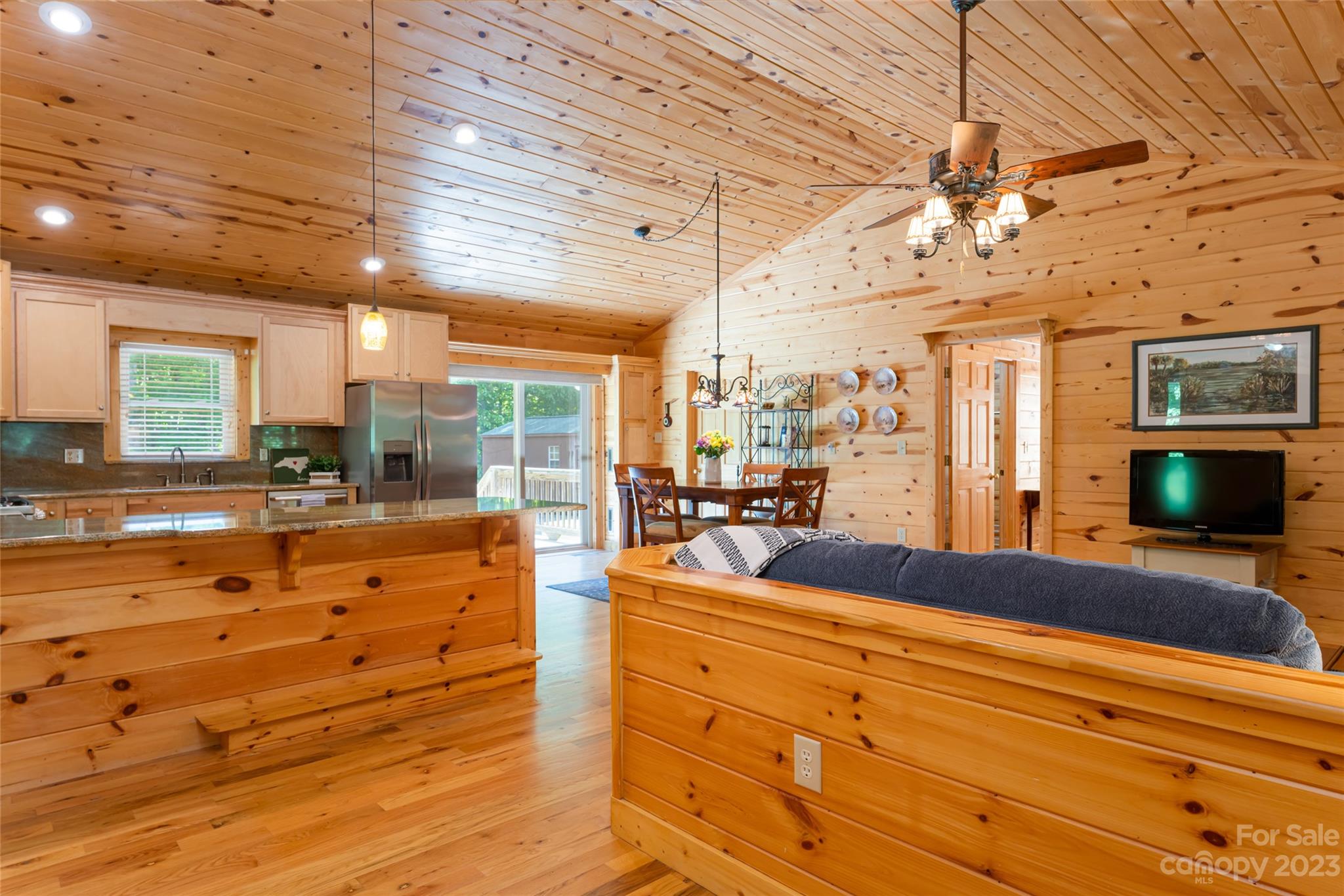 134 Quebec Trail Bostic, NC 28018 - Photo 9 of 37 a view of living room with granite countertop furniture and fireplace