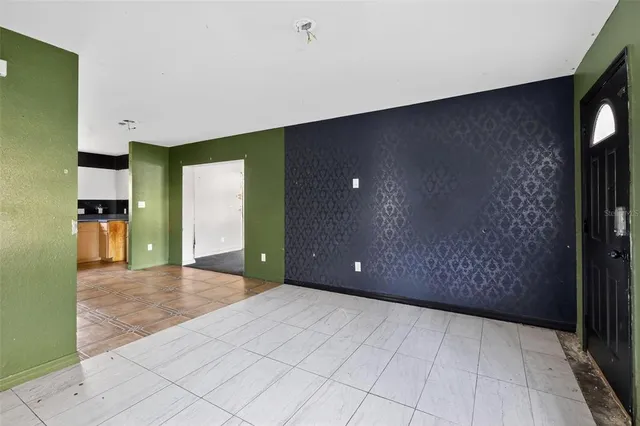 a view of a livingroom with a staircase