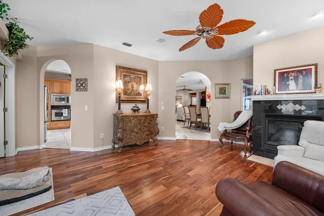 a kitchen with stainless steel appliances granite countertop a stove oven and a refrigerator