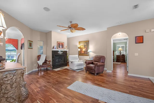 a kitchen with stainless steel appliances granite countertop a stove refrigerator and cabinets