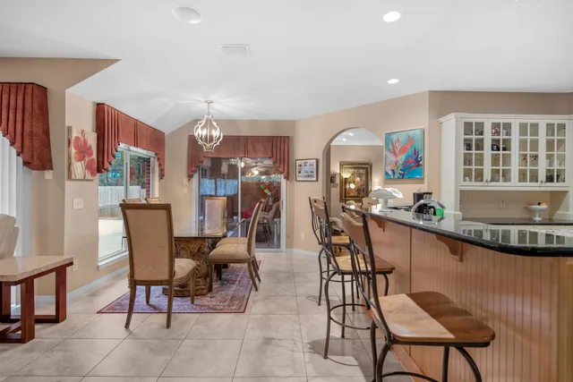 a bathroom with a sink vanity and mirror