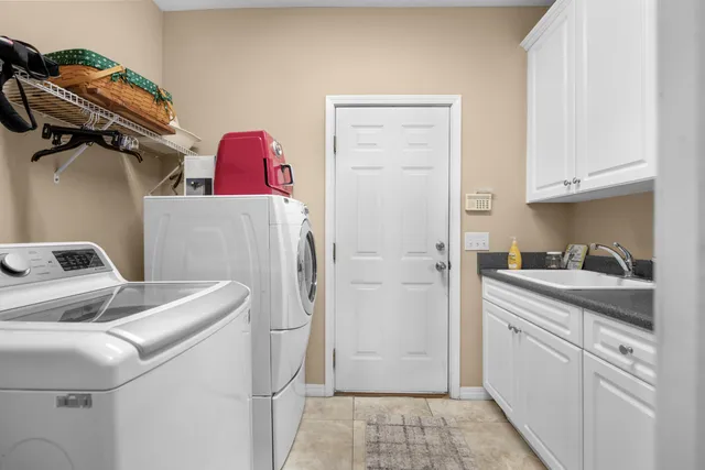 a bathroom with a tub sink and toilet