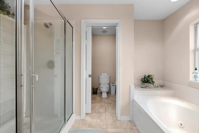 a bed room with a bed and a dresser