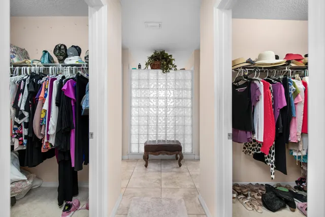 an aerial view of a house with garden space and sitting area