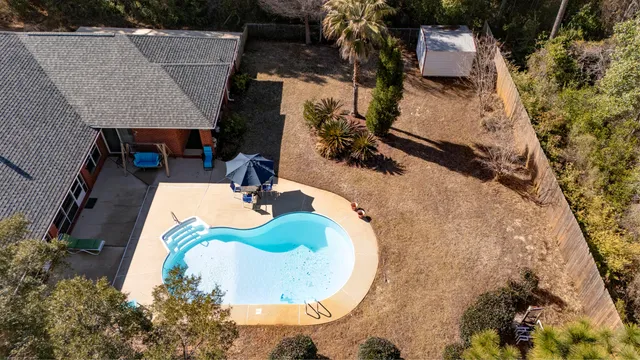 a view of a swimming pool with an ocean view