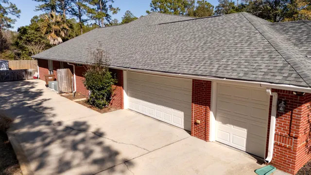 an outdoor space with pool and furniture