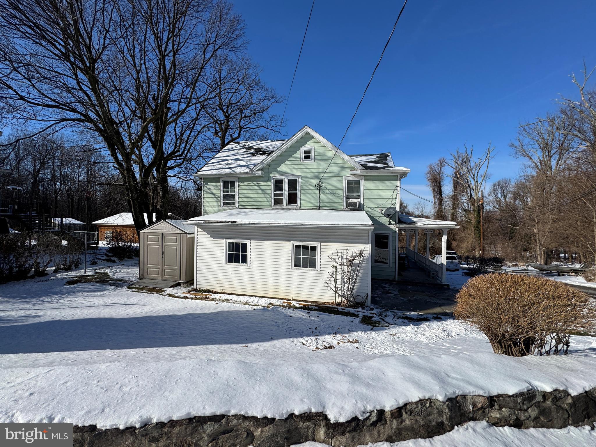 14516 Pen Mar High Rock Road Cascade, MD 21719 - Photo 3 of 20 a front view of a house with a yard