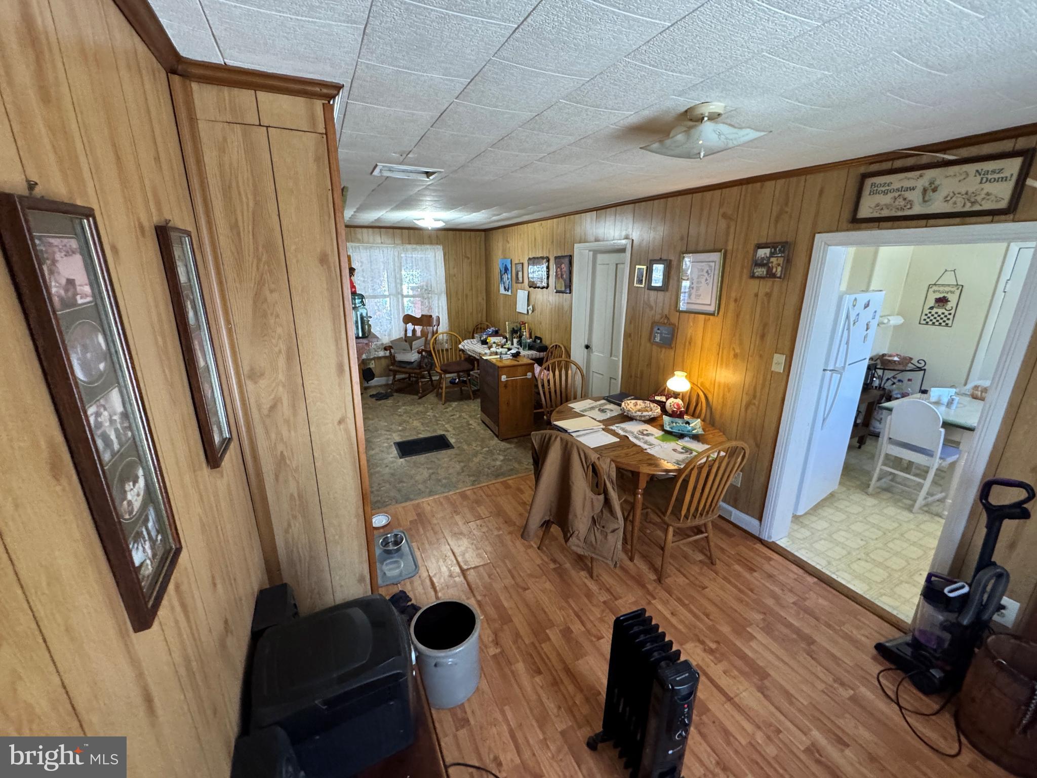 14516 Pen Mar High Rock Road Cascade, MD 21719 - Photo 5 of 20 a view of a dining room with furniture window and wooden floor