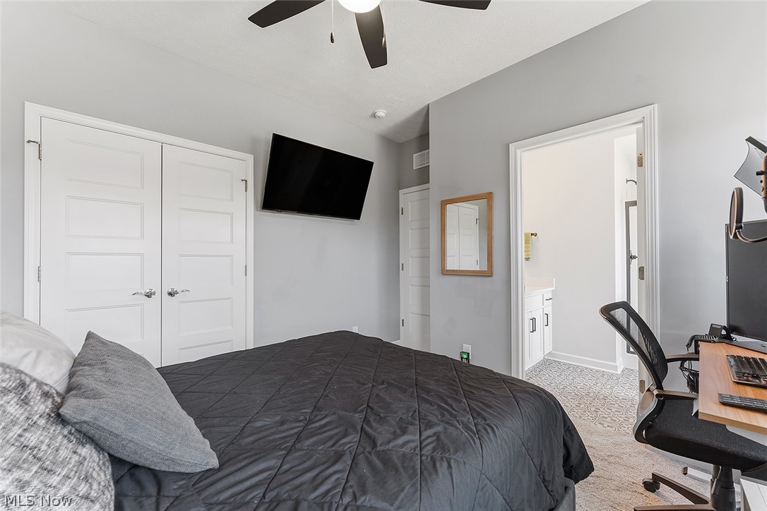 2308 Fulton Road Cleveland, OH 44113 - Photo 24 of 30 Bedroom featuring light gray walls and a ceiling fan