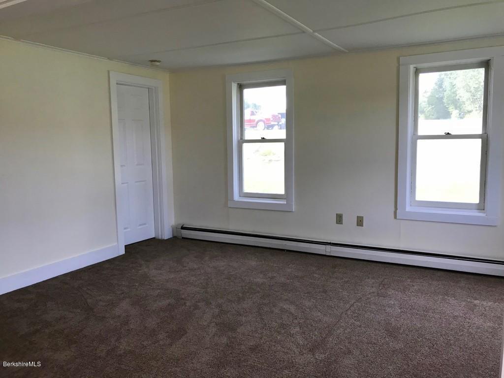 221 Number 9 Road Rowe, MA 01367 - Photo 22 of 27 an empty room with windows