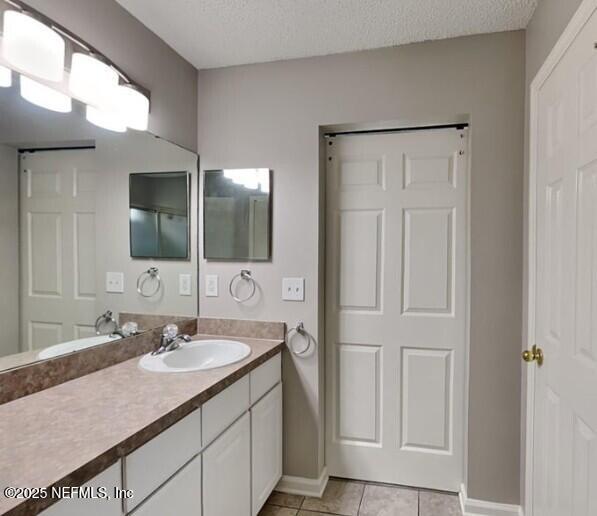 844 MacKenzie Circle St. Augustine, FL 32092 - Photo 11 of 20 a bathroom with a sink and a mirror
