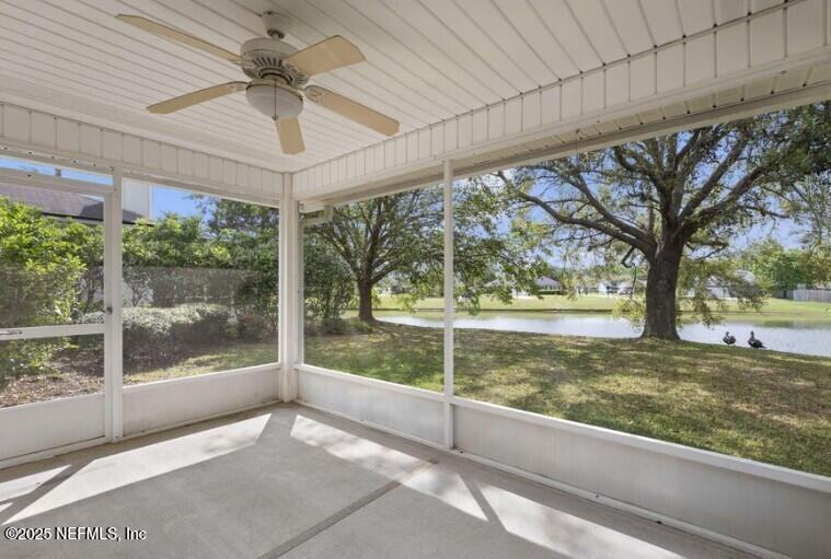 844 MacKenzie Circle St. Augustine, FL 32092 - Photo 2 of 20 a view of a room with a large window and wooden floor