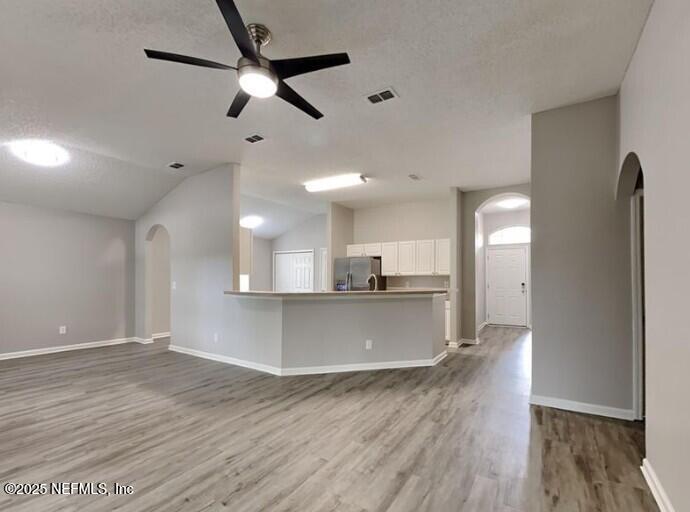 844 MacKenzie Circle St. Augustine, FL 32092 - Photo 3 of 20 a view of a kitchen with a sink and a refrigerator