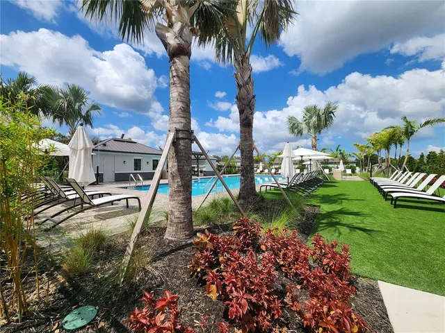 a view of swimming pool with a lake