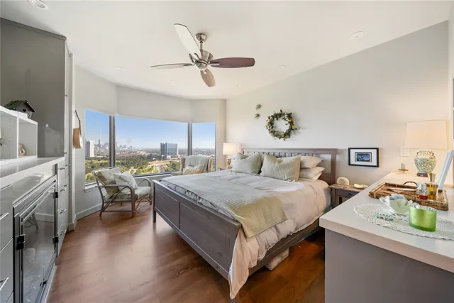a living room with flat screen tv and a fireplace