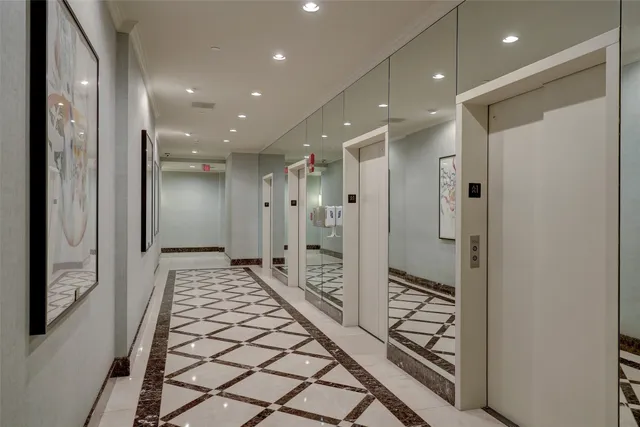 a view of a livingroom with furniture window and wooden floor