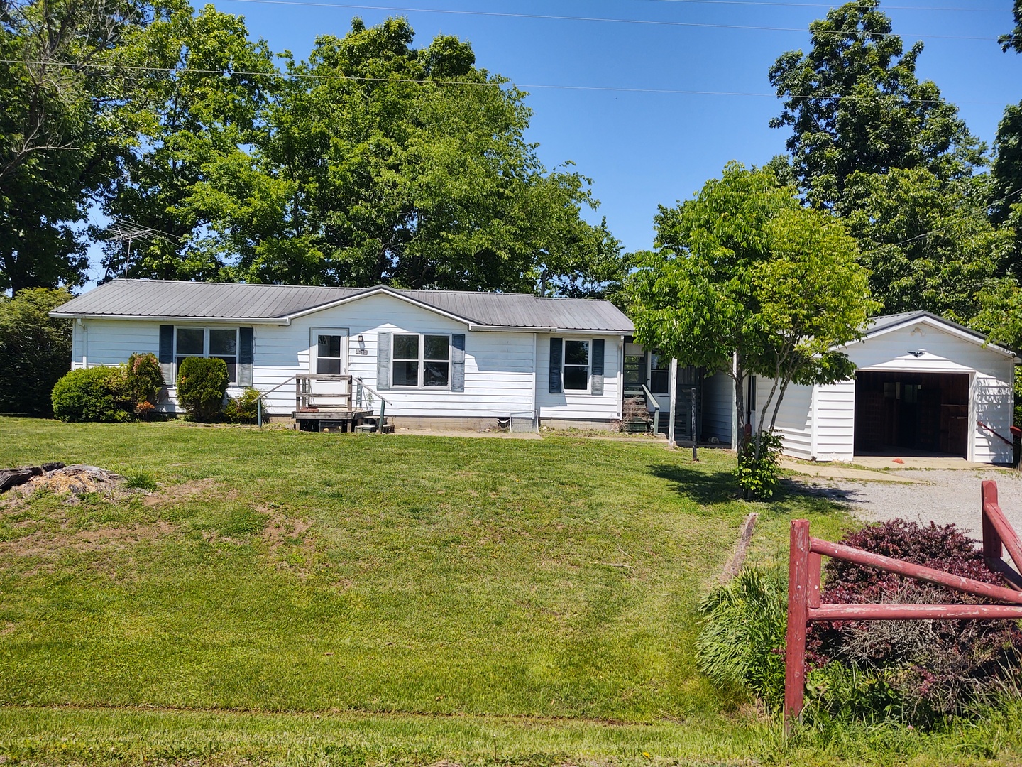 1045 Ozark Road Ozark, IL 62972 - Photo 1 of 17 a view of a house with pool and a yard