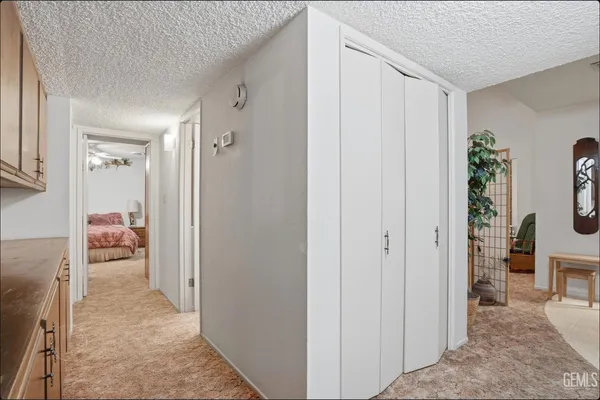 a view of a bathroom from a hallway