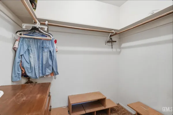 a view of small space with racks on the wall
