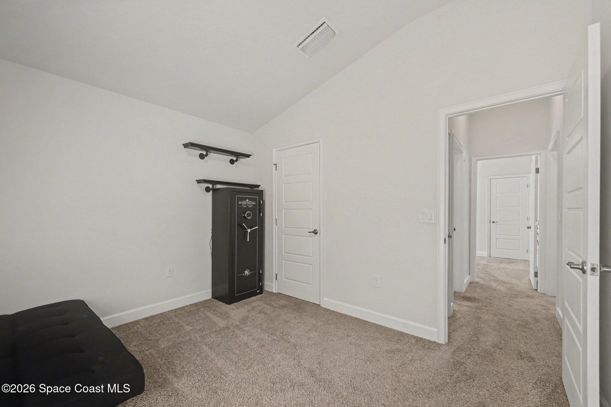 831 Tupelo Circle Cocoa, FL 32926 - Photo 12 of 23 a view of a hallway with closet