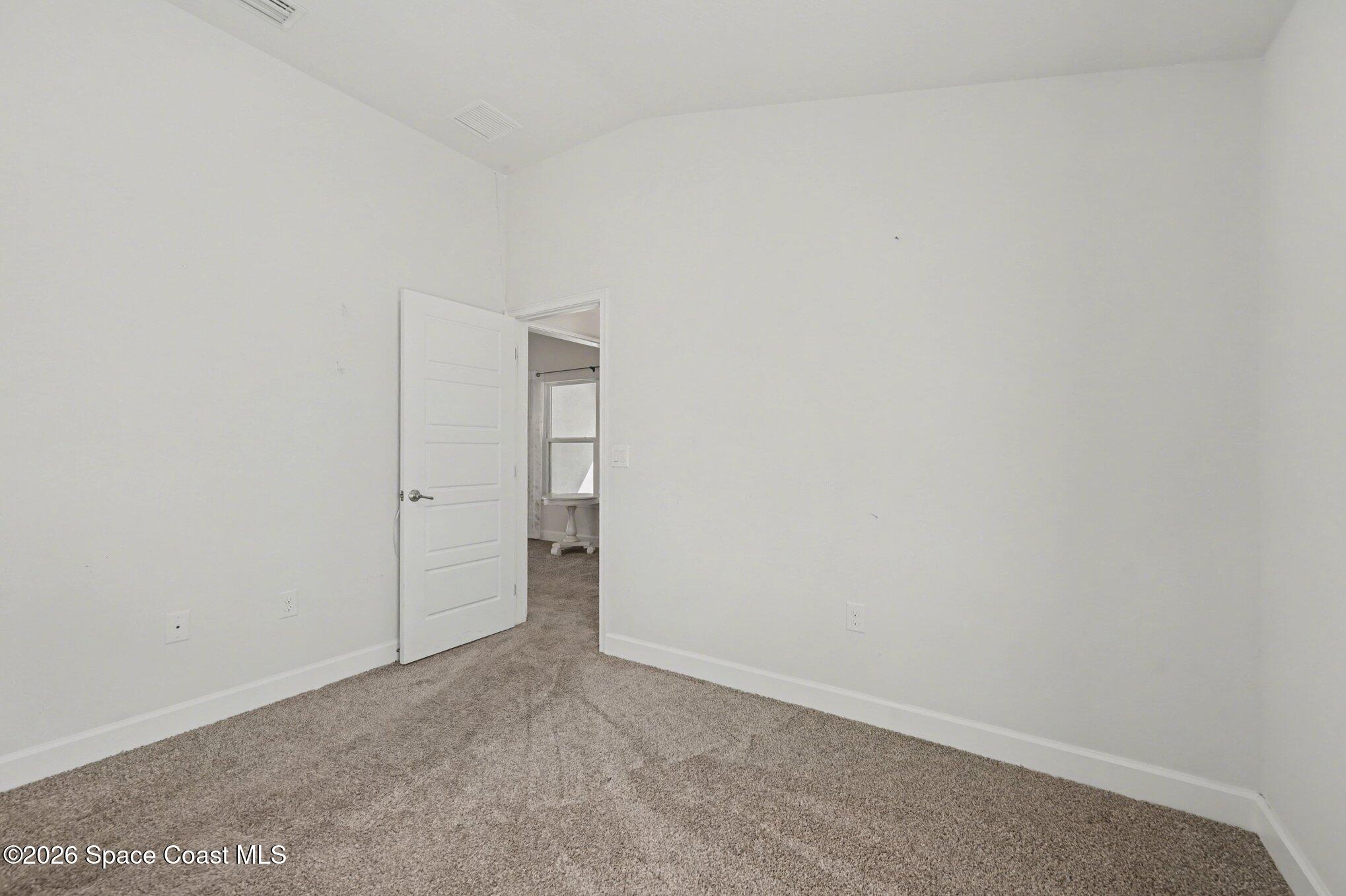 831 Tupelo Circle Cocoa, FL 32926 - Photo 18 of 23 a view of an empty room