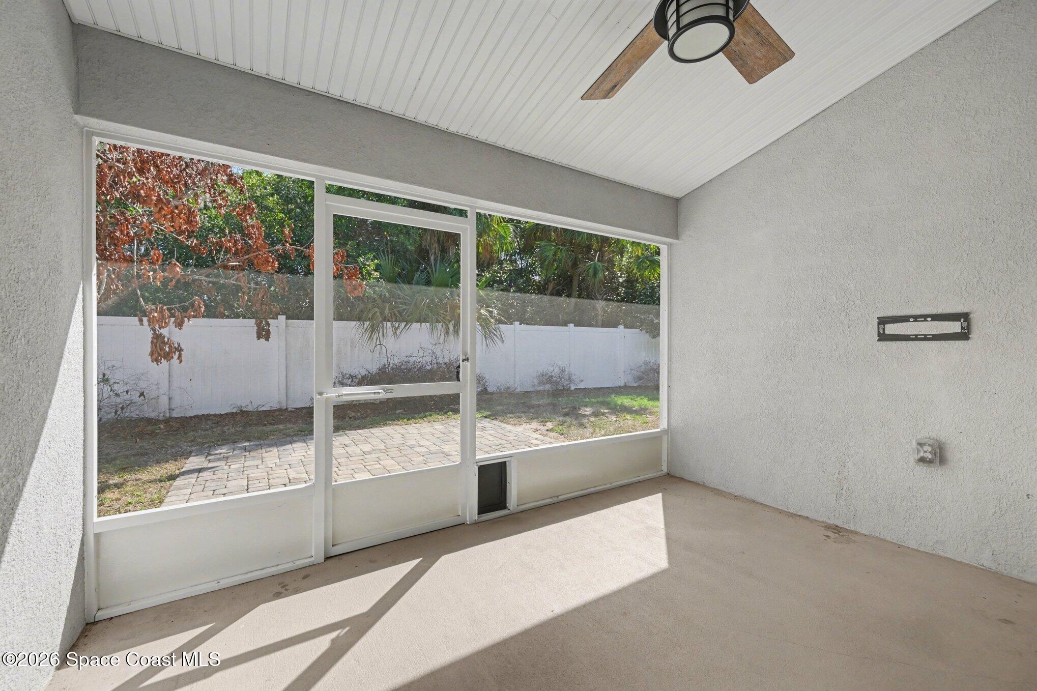 831 Tupelo Circle Cocoa, FL 32926 - Photo 21 of 23 a view of room with window and a ceiling fan