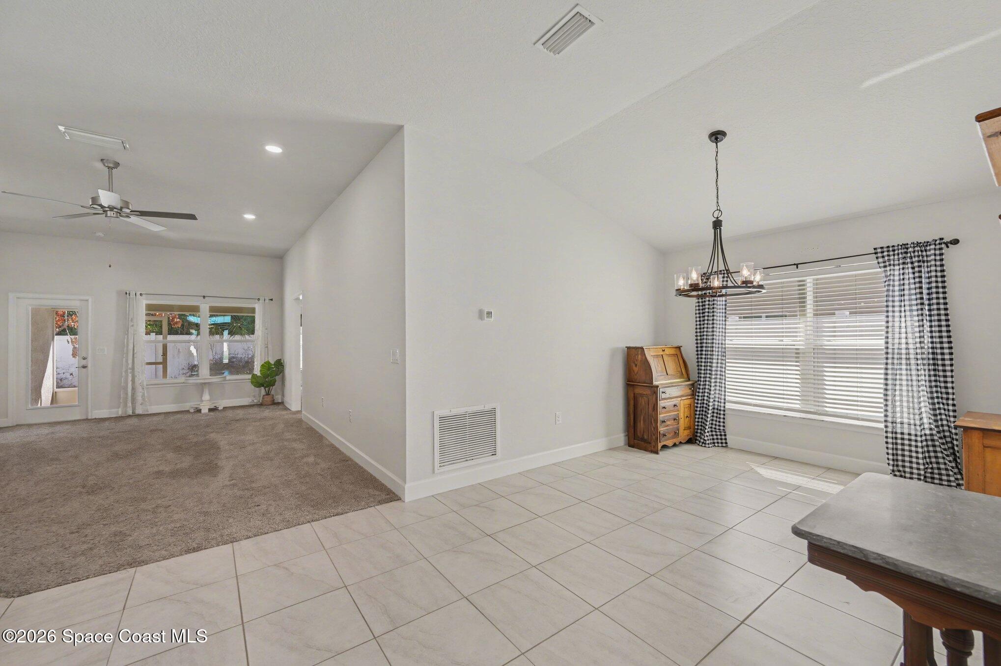 831 Tupelo Circle Cocoa, FL 32926 - Photo 7 of 23 a view of a livingroom with a furniture and windows