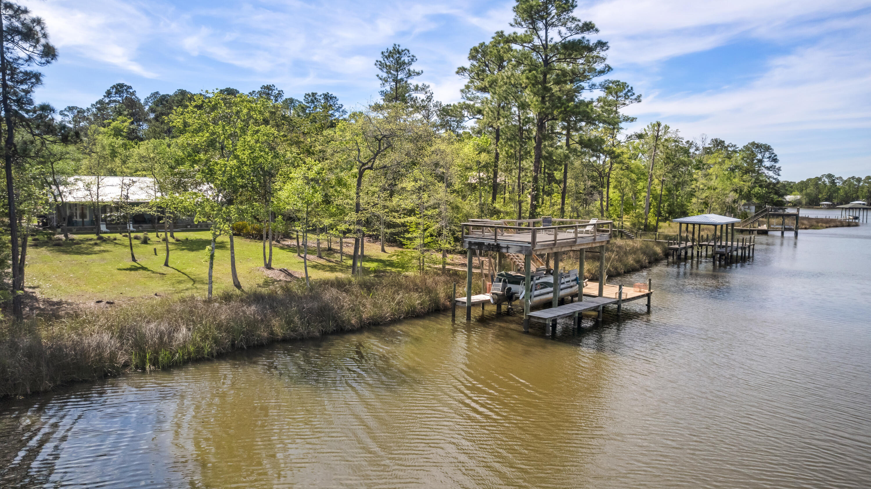 528 Bay Grove Road Freeport, FL 32439 - Photo 50 of 68 a view of a lake with houses