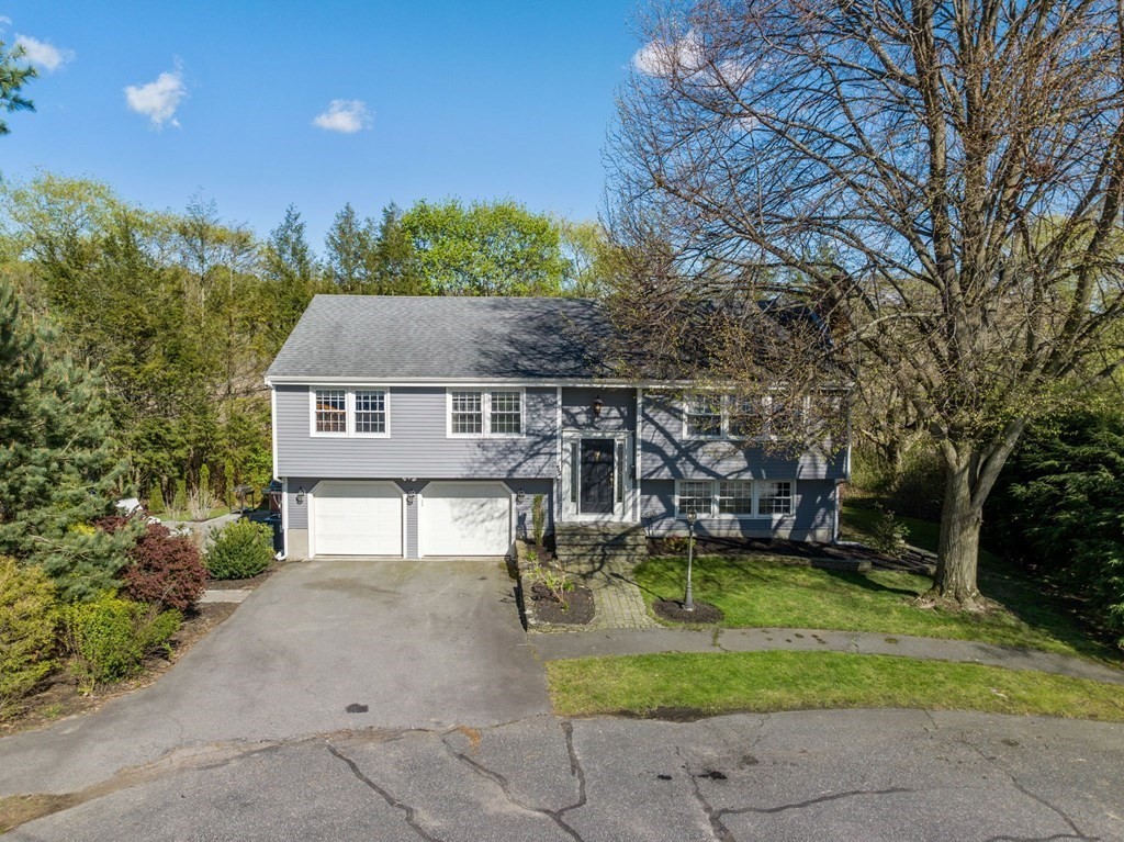 55 Glover Road Needham, MA 02494 - Photo 22 of 22 a view of a house with backyard porch and sitting area