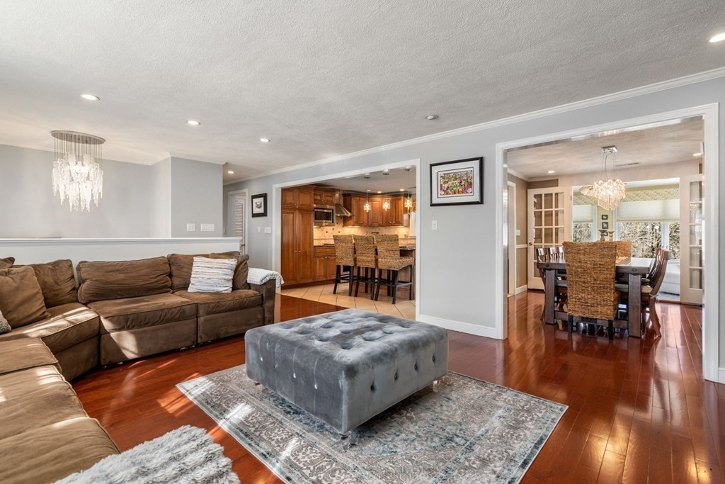 55 Glover Road Needham, MA 02494 - Photo 3 of 22 a living room with furniture and a wooden floor