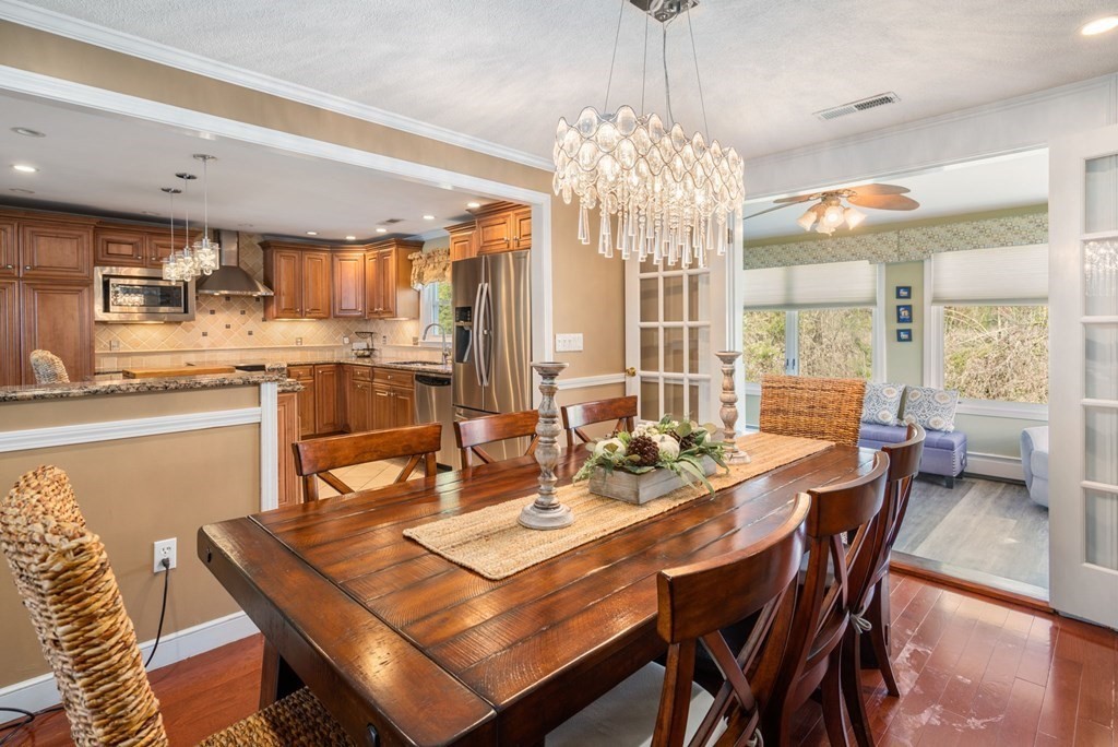 55 Glover Road Needham, MA 02494 - Photo 8 of 22 a view of a dining room and livingroom view