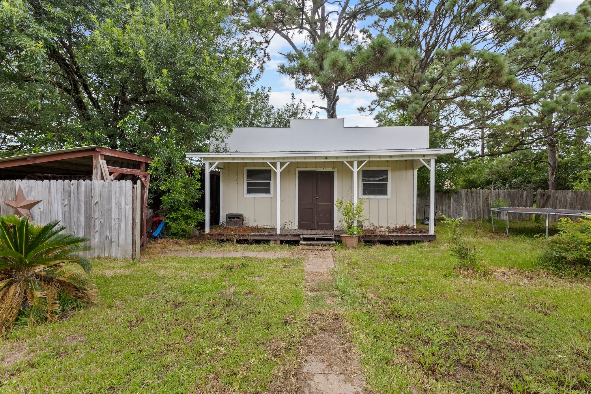 6281 25th Street Groves, TX 77619 - Photo 23 of 26 a backyard of a house with seating space