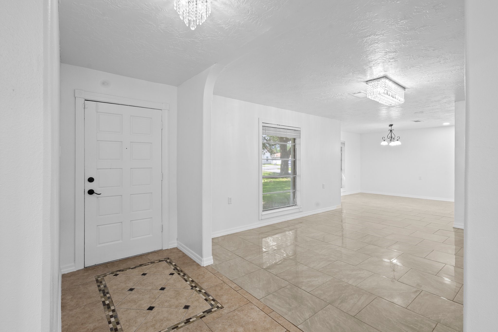 6281 25th Street Groves, TX 77619 - Photo 10 of 26 a view of an empty room with a window