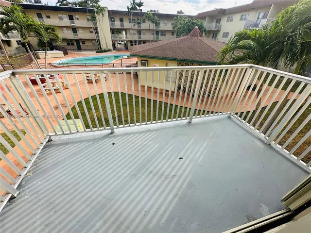 a balcony with an outdoor space
