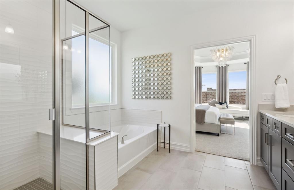 4352 Noble Lane Midlothian, TX 76065 - Photo 13 of 21 a bathroom with a tub shower and sink