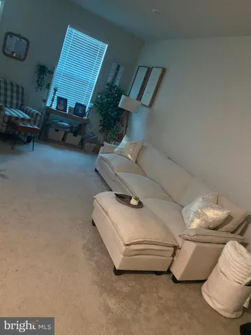 a room with a dresser and a mirror