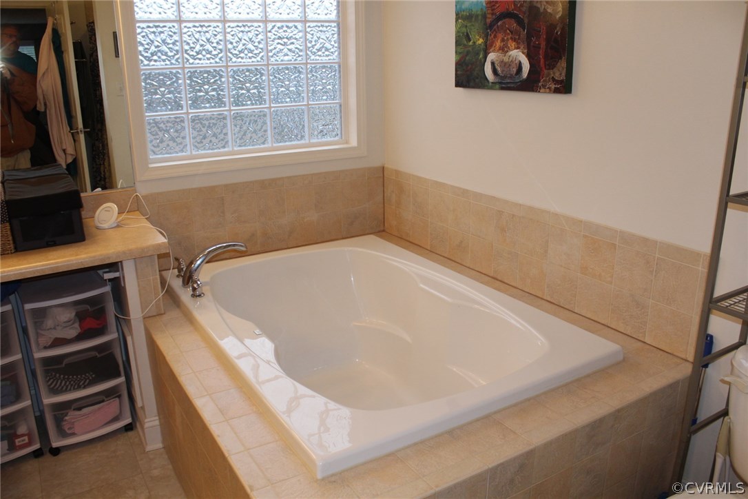 634 Holman Mill Road Farmville, VA 23901 - Photo 11 of 43 a bath tub sitting next to a window