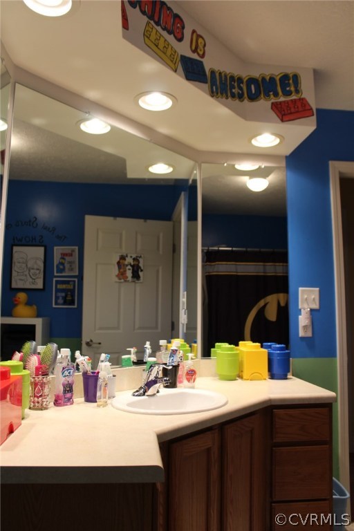 634 Holman Mill Road Farmville, VA 23901 - Photo 29 of 43 a bathroom with a sink and a mirror