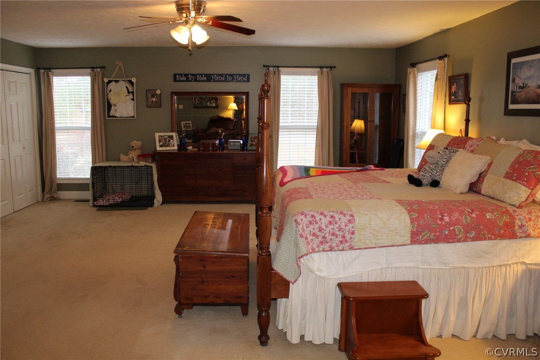 634 Holman Mill Road Farmville, VA 23901 - Photo 5 of 43 a bedroom with a bed and a couch