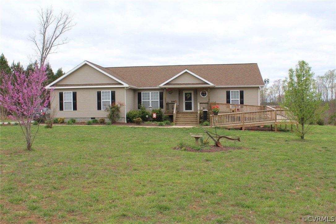 634 Holman Mill Road Farmville, VA 23901 - Photo 9 of 43 a front view of a house with a yard