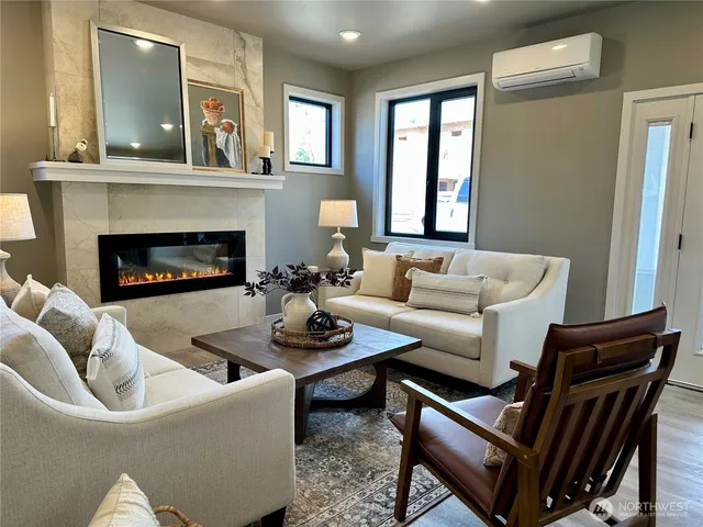 a large kitchen with a table and chairs