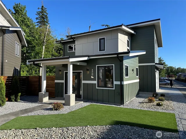 a view of a house with backyard porch and porch
