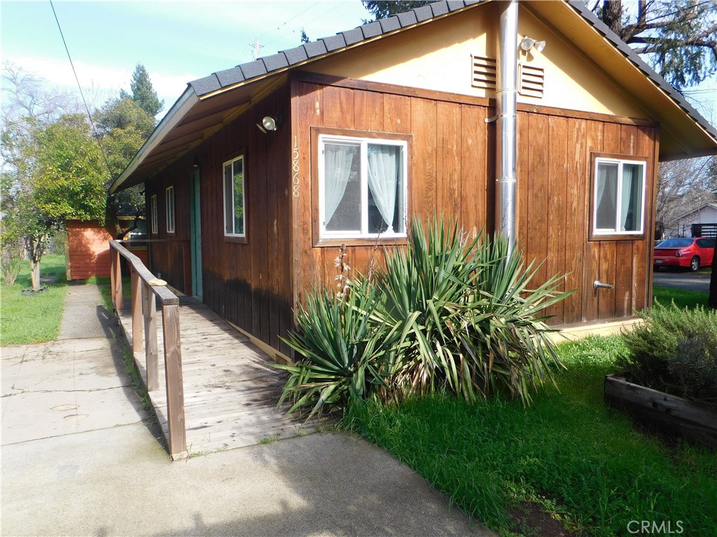 15868 Main Street Middletown, CA 95461 - Photo 1 of 16 a view of a house with backyard and garden