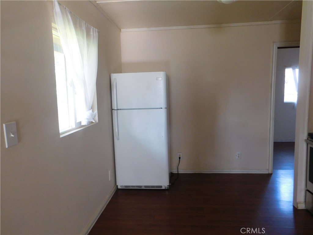 15868 Main Street Middletown, CA 95461 - Photo 12 of 16 a view of utility room with closet and wooden floor