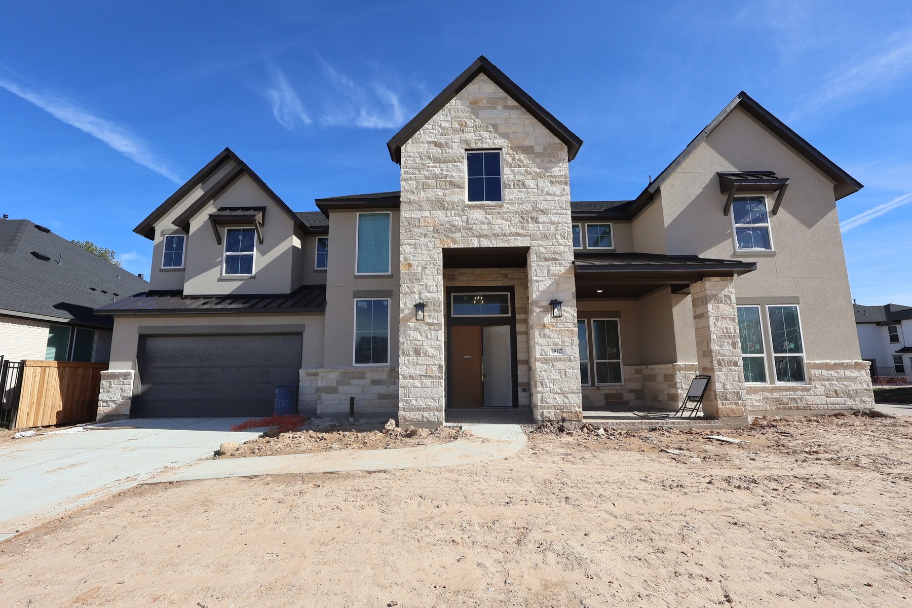 28117 Fox Bnd Drive Spring, TX 77386 - Photo 5 of 6 a front view of a house with a yard and garage