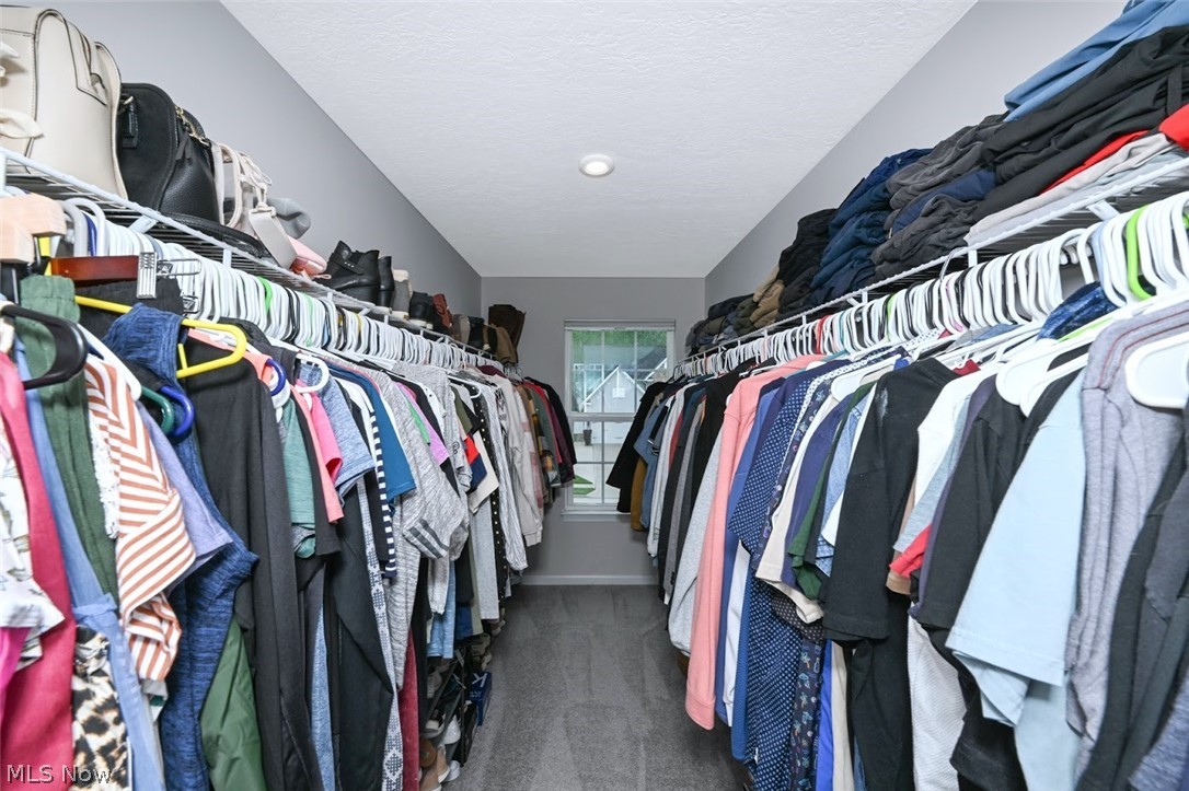 3021 Stonehurst Road Uniontown, OH 44685 - Photo 24 of 48 *WALK IN 14 FT. LONG CLOSET IN THE MASTER BEDROOM! RECESSED LIGHTING & WOULD LOOK AMAZING WITH A SMALL CHANDELIER! ~