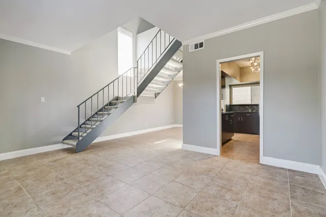 a view of an entryway with hallway