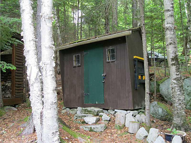 440 Birches Beach Road Oquossoc, ME 04964 - Photo 9 of 35 Exterior Front.