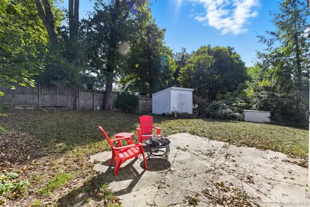 a backyard of a house with seating space